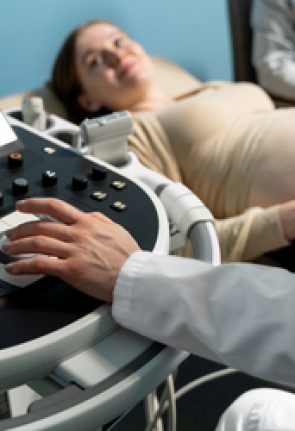 gynecologist-performing-ultrasound-consultation (1)